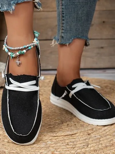 Vetersluitende slip-ons met ronde neus