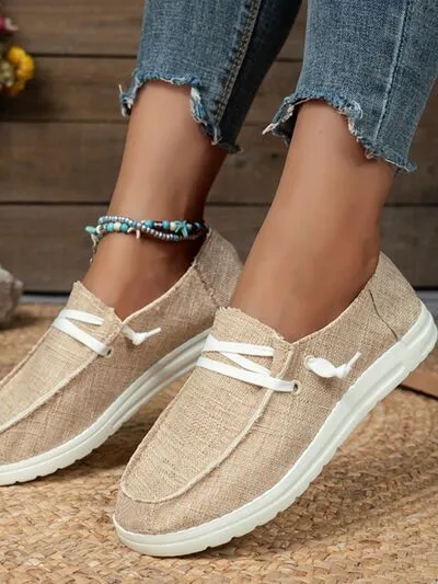 Vetersluitende slip-ons met ronde neus